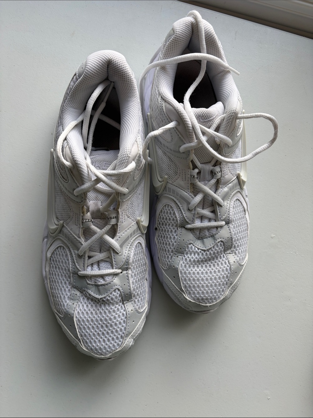 Nike Women’s White and Silver Mesh Athletic Sneakers